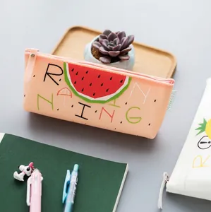 Watermelon pattern pink silicone pencil case for students on a minimalist desk