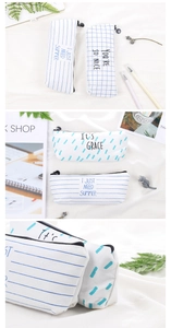 Detail shots of blue and white canvas pencil case with artistic summer lettering print