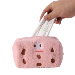 Cute pink plush biscuit pencil case with large capacity shown holding colorful markers