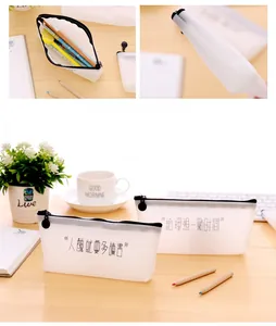 Detail of white translucent waterproof pencil cases with Chinese calligraphy and black zippers