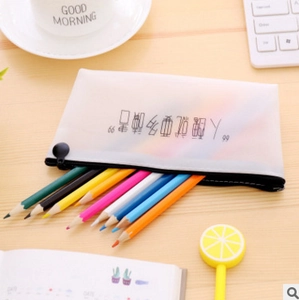 Funny Chinese slogan translucent pencil case with black zipper on a wooden desk