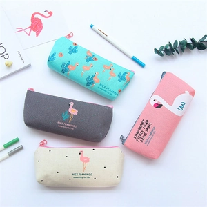 Detailed flat lay of canvas pencil cases in pastel colors with flamingo and cactus motifs
