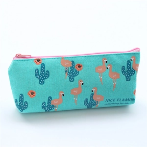 Close-up of canvas pencil case with flamingo and cactus patterns and zipper detail