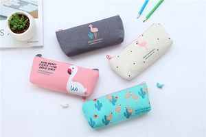 Close-up of four minimalist flamingo canvas pencil cases in various pastel colors