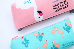 Close-up of canvas flamingo pencil cases with high-quality zipper and printed slogans