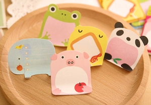 Close-up of cute zoo animal sticky notes with panda, pig, and elephant designs for students