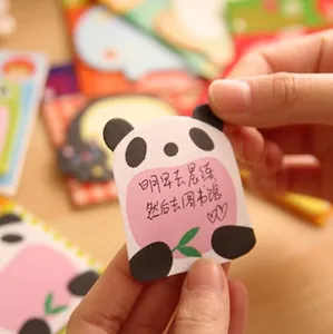 Cute panda sticky notes for students held by hand showing practical writing scale