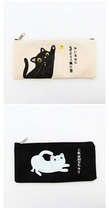 Detail of durable canvas pencil pouches with cute cat prints and sturdy metal zippers