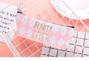 Pink and white rhombic pattern canvas pencil case with gold lettering and zipper detail