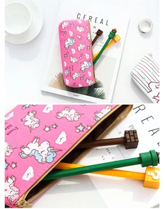 Detail of pink canvas unicorn pencil case with zipper closure and spacious interior