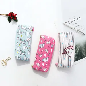 Unicorn canvas pencil pouches in pink and blue with Dream like a unicorn slogans