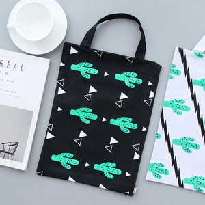 Canvas cactus print document bags in black and white with zippers and handles