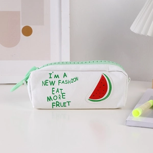 Detail of white canvas pencil case with large green zipper and watermelon patch