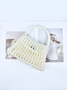 Handmade woven pearl handbag for women with white resin beads in a minimalist square design