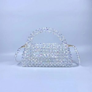 Iridescent beaded pillow handbag with crossbody strap and AB colorful glossy finish