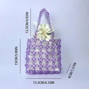 Detail view of purple beaded handbag with inner satin pouch and specific dimensions