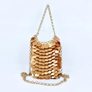Detail of champagne gold sequin chain bag with metallic fish scale texture