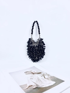 Handmade black acrylic beaded handbag with faceted studs and round bead handle