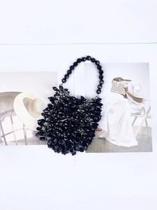 Retro handmade black acrylic beaded handbag for women featuring a vintage teardrop design