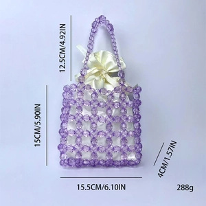 Detail view of purple beaded handbag with dimensions 15.5x15cm and satin drawstring liner