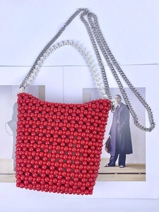 Handmade red beaded bucket bag with white pearl handle and silver chain strap