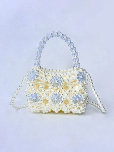 Handmade woven pearl bag with blue floral beads, crossbody and top handle style