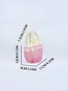 Detailed size view of a handmade pink beaded bucket bag with yellow drawstring liner
