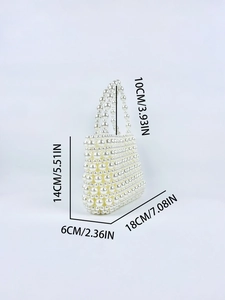 Detail of white pearl beaded tote bag with precise measurements for handle and body