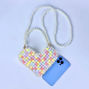 Handmade beaded heart-shaped mini cross-body bag in vibrant candy-colored acrylic beads