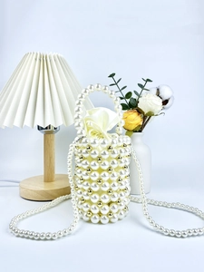 Elegant handmade pearl beaded bucket bag with drawstring liner and long shoulder strap