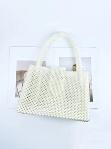 Handmade white pearl beaded tote bag with a woven rectangular design and pearl top handle