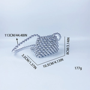 Detailed view of silver beaded mini bag dimensions: 10.5cm length with crossbody strap