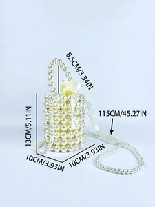 Detail view showing dimensions of handmade pearl beaded bucket bag with drawstring liner