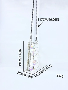Detail view of shimmering white sequin chain bag with silver strap and size dimensions