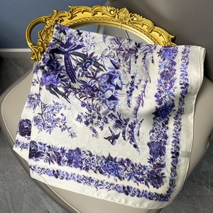 French style square satin scarf with purple Toile de Jouy print on light grey chair