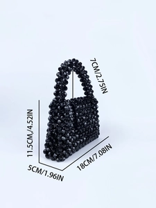 Detailed dimensions of the black beaded handbag with height 11.5cm and width 18cm