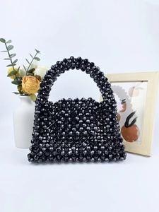 Elegant handmade black beaded trapezoid handbag with polished faceted beads for banquets
