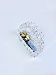 Detailed top view of handmade beaded handbag showing interior storage for phone and makeup