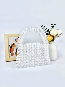 Elegant handmade transparent beaded handbag for women featuring a minimalist square shape