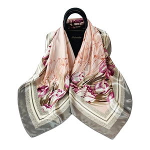 90cm satin silk square scarf with pink tulip floral print draped on a handbag