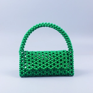 Borsa a mano verde in perline di acrilico fatta a mano con manico retrò e trama tessuta