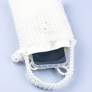 Handmade white faux pearl beaded phone bag with drawstring satin lining and top handle