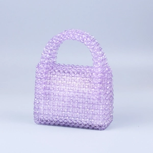 Close-up of handmade lavender acrylic beaded bag with faceted jelly texture and top handle