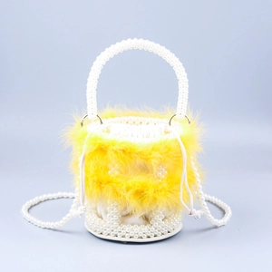 Chic yellow feather and pearl bucket bag with beaded handle for stylish women