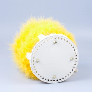 Chic lemon yellow feather handbag with white pearl accents and studded leather base