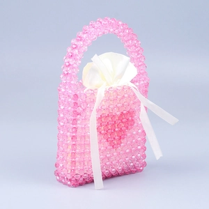 Pink heart-shaped acrylic beaded handbag with elegant cream satin drawstring lining
