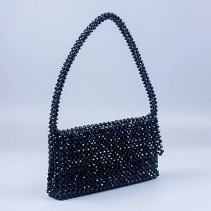 Handmade black acrylic beaded flap handbag with crossbody strap in rectangular shape