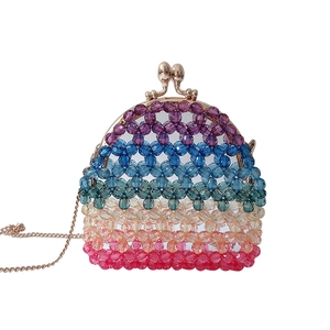 Close-up of rainbow acrylic beaded bag showing six-layer color gradient and metal clasp