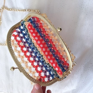 Handmade rainbow acrylic beaded clutch bag with colorful stripes and gold chain strap