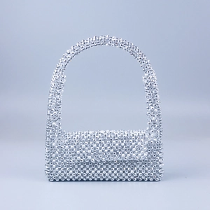 Silver beaded acrylic flap handbag with metallic finish and handmade woven shoulder strap
